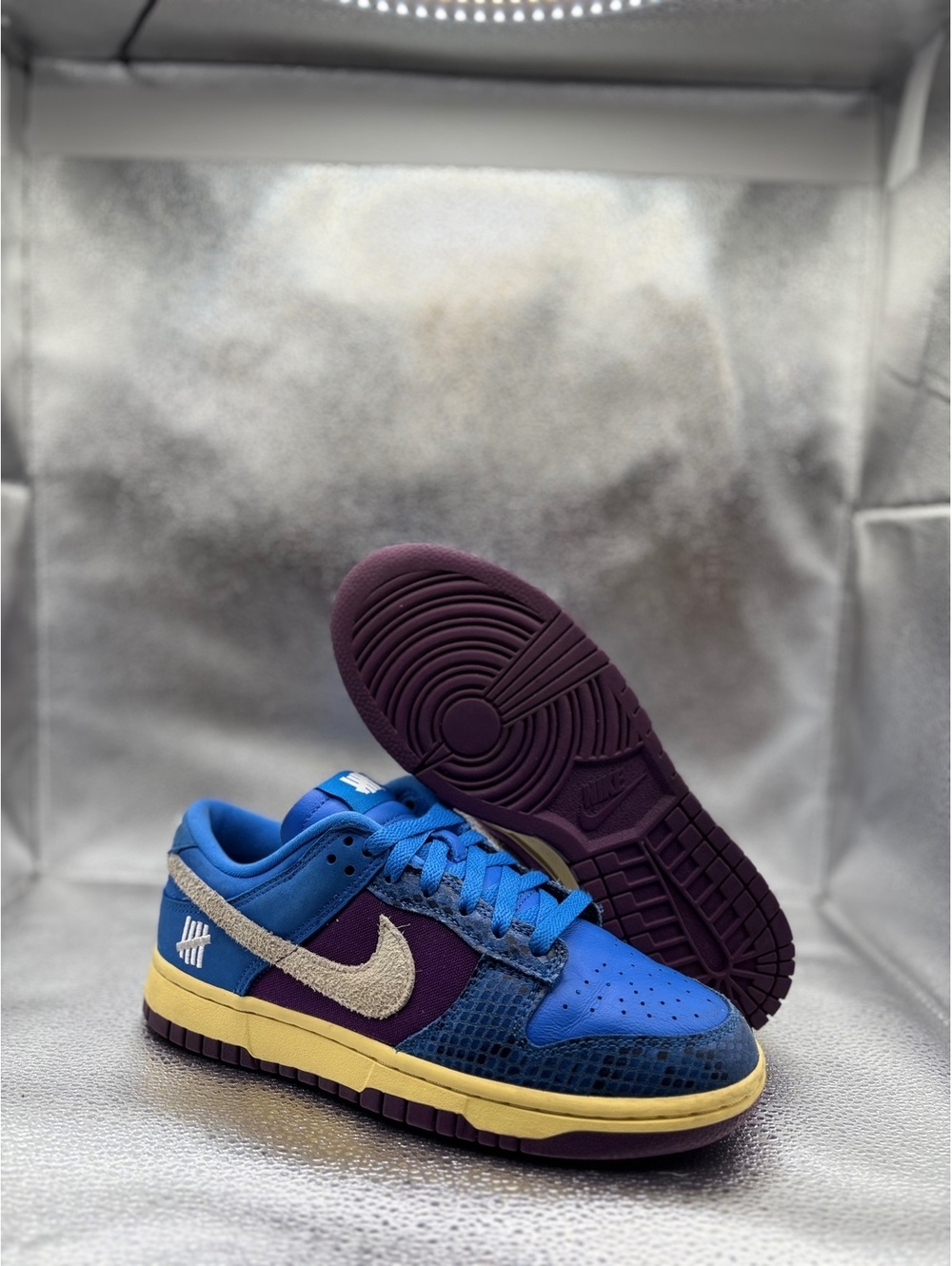 Nike X undefeated dunk low SP on it